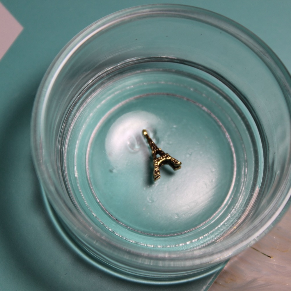 Gold eiffel tower floating charm
